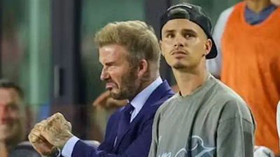 'Proud of you mate!' - Inter Miami co-owner David Beckham shows support for son Romeo's modelling career as sleeveless ex-Brentford forward appears on Versace catwalk
